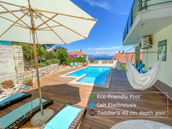 Apartmaji Sonce z bazenom, Korčula - terasa s kamnitim žarom.